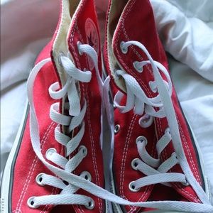 Brand new red high top converse